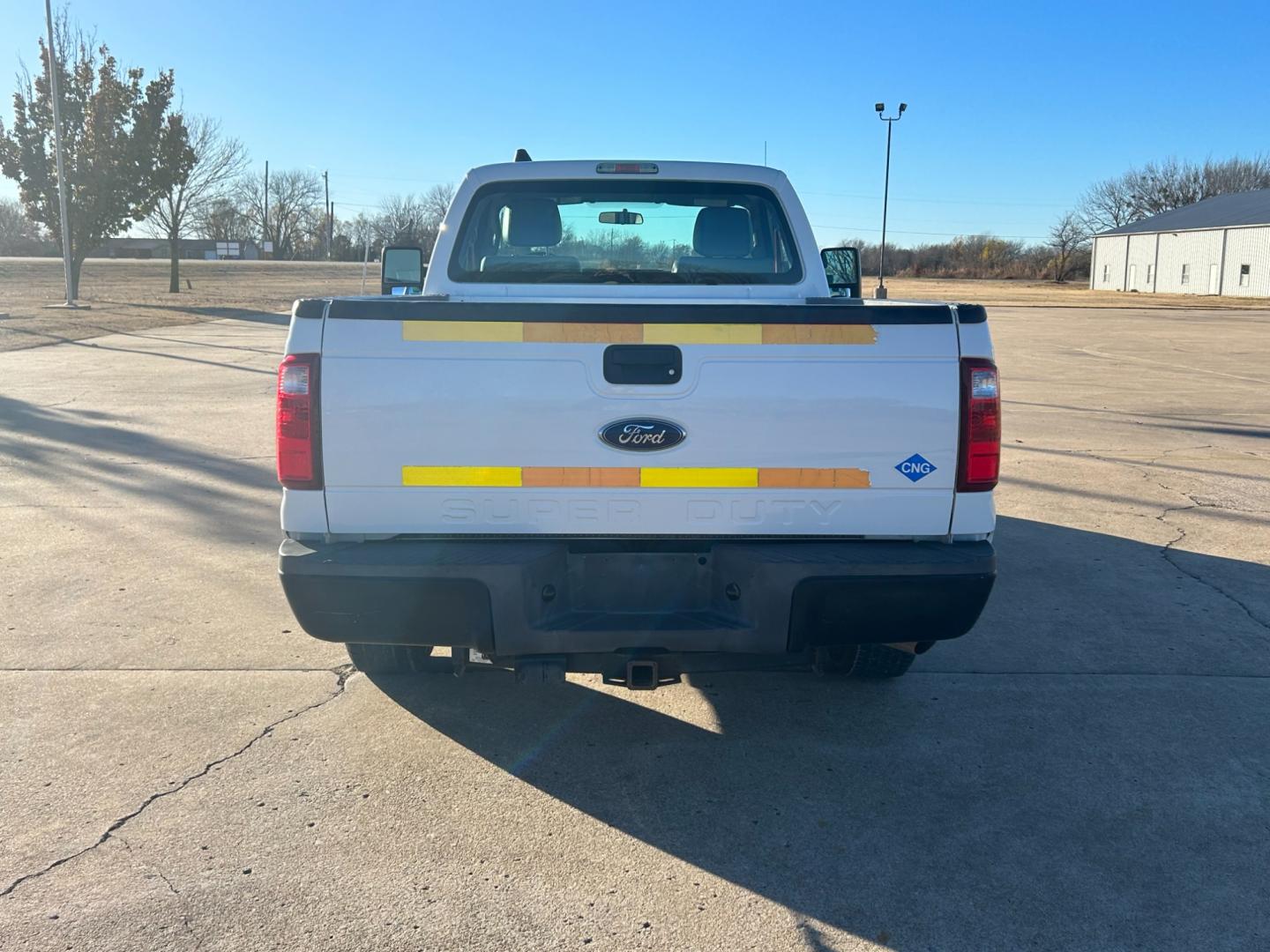 2013 White Ford F-250 SD (1FTBF2A68DE) , located at 17760 Hwy 62, Morris, OK, 74445, (918) 733-4887, 35.609104, -95.877060 - 2013 FORD F-250 SD XL 2WD DEDICATED CNG (ONLY RUNS ON COMPRESSED NATURAL GAS). FEATURES MANUAL SEATS, MANUAL WINDOWS, MANUAL LOCKS, MANUAL MIRRORS, AM/FM STEREO, CRUISE CONTROL, TRACTION CONTROL, LEATHER SEATS. IT IS EQUIPPED WITH A CNG FUELING SYSTEM, IT RUNS ON COMPRESSED NATURAL GAS. A PREMIER AL - Photo#5